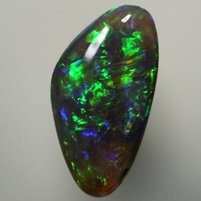 SOLID BLACK OPAL Sparkling bright greens and orange in a 3D pattern